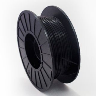 Fluorinar-B™ black PVDF 3D printing filament on a black spool.